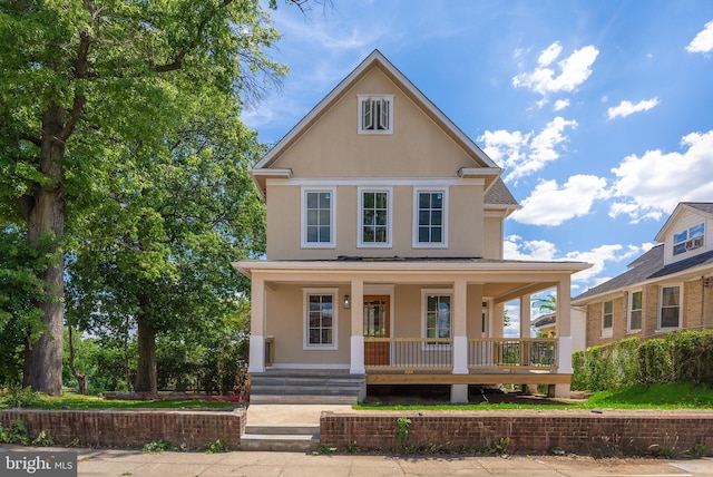 view of property with covered porch