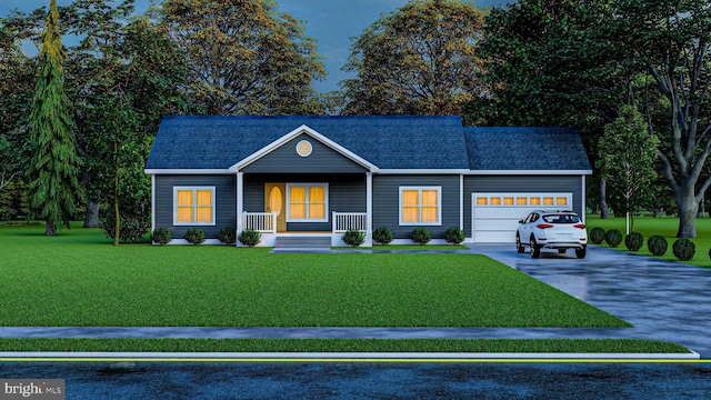 view of front of house with a front lawn, covered porch, and a garage