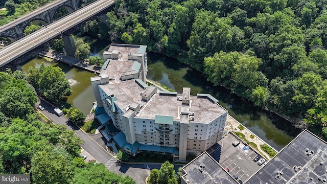 birds eye view of property featuring a water view