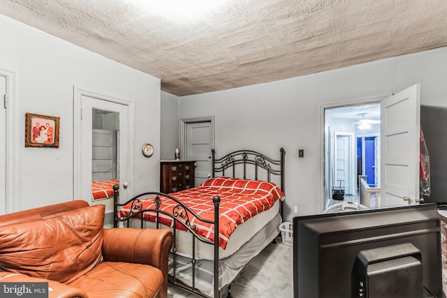 bedroom with a textured ceiling