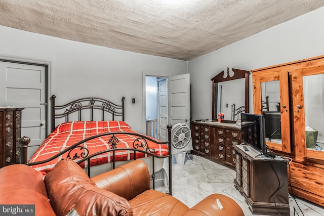 bedroom with a textured ceiling