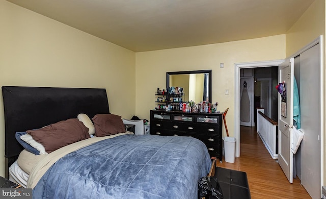 bedroom featuring hardwood / wood-style flooring