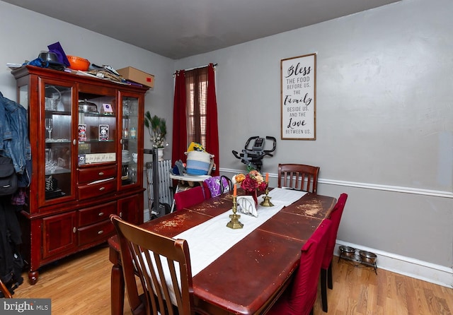 dining space featuring light hardwood / wood-style floors