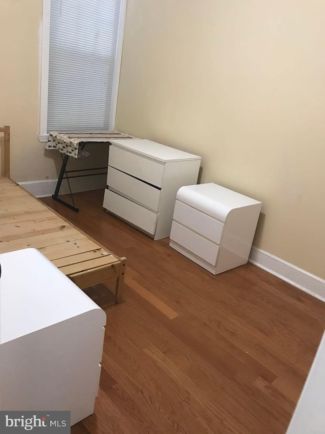 bedroom with light hardwood / wood-style flooring