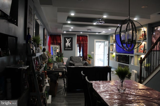 dining space featuring a notable chandelier