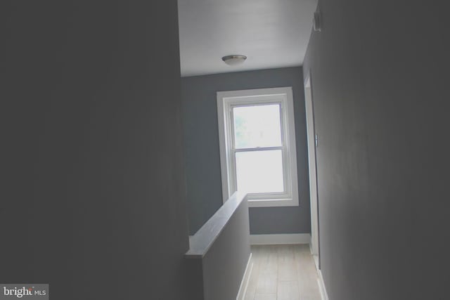 corridor featuring light wood-type flooring