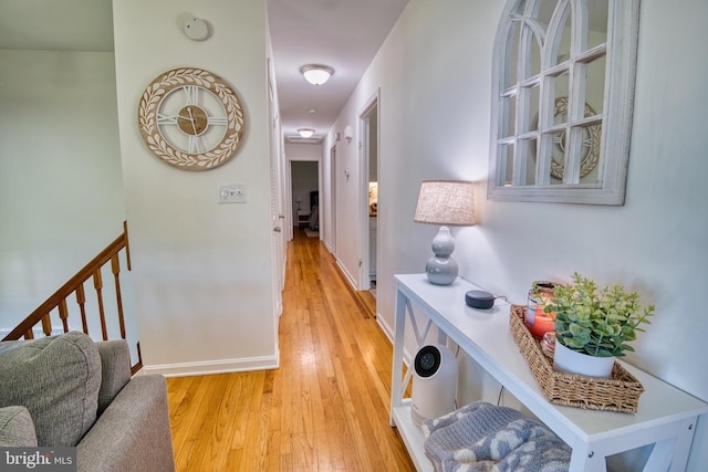 hall with light wood-type flooring