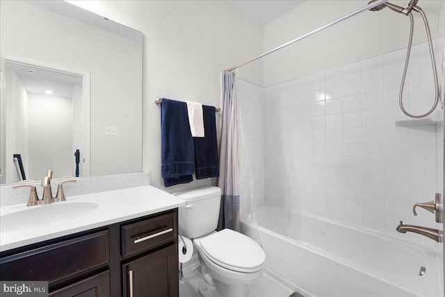 full bathroom featuring vanity, shower / bath combination with curtain, and toilet