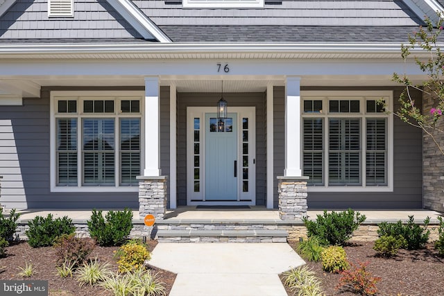 property entrance featuring covered porch