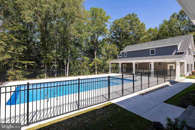 view of swimming pool featuring a patio