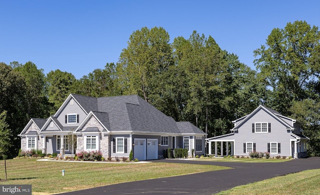 view of front of home with a front yard