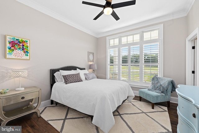 bedroom with hardwood / wood-style flooring, ceiling fan, and crown molding