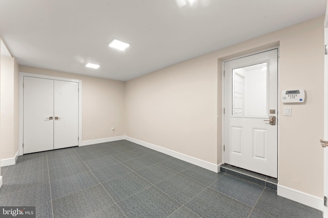 view of tiled foyer entrance