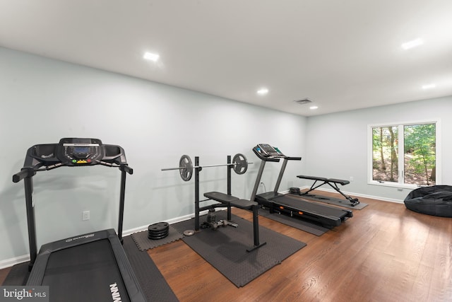 exercise area with hardwood / wood-style floors