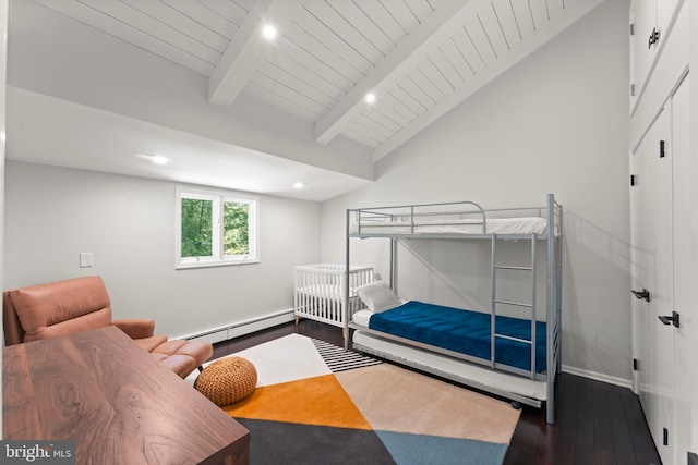 bedroom featuring a baseboard heating unit, lofted ceiling with beams, and dark wood-type flooring