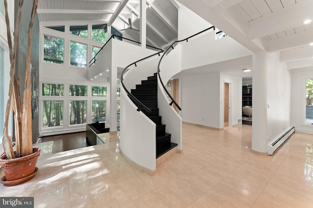 staircase featuring high vaulted ceiling, beam ceiling, a baseboard heating unit, and light tile floors