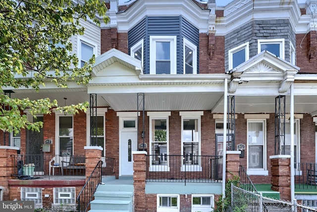 view of property with covered porch