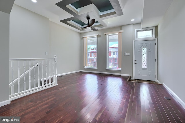 entryway featuring a wealth of natural light, ceiling fan, and dark wood-type flooring