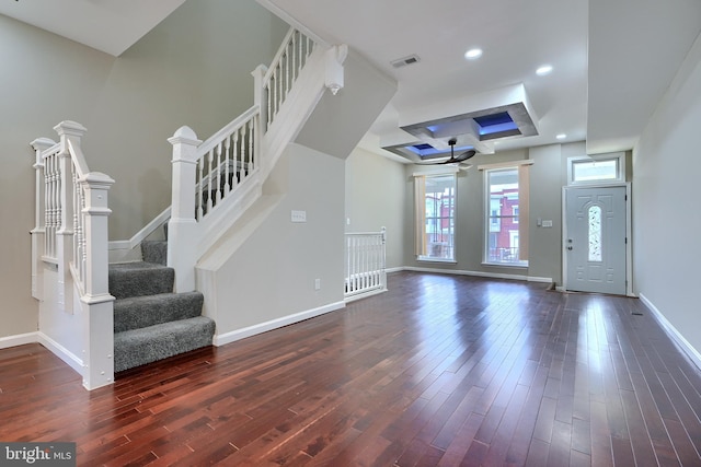 foyer entrance featuring dark hardwood / wood-style floors