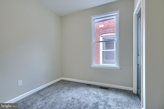 view of carpeted spare room