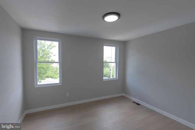 empty room featuring light hardwood / wood-style floors