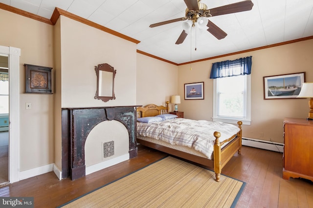 bedroom featuring ceiling fan, dark hardwood / wood-style flooring, crown molding, and a baseboard radiator