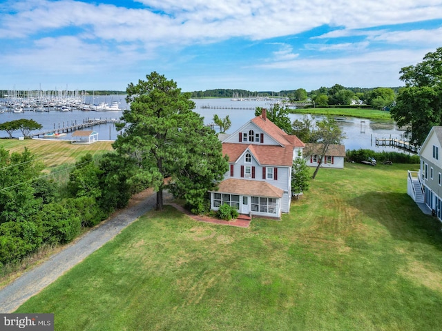 drone / aerial view with a water view