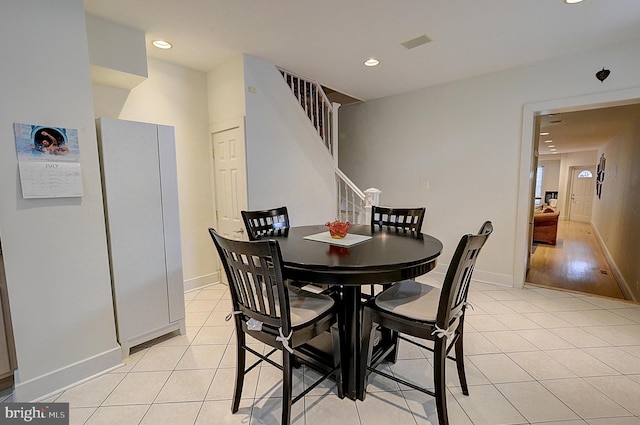 dining room with light tile patterned floors