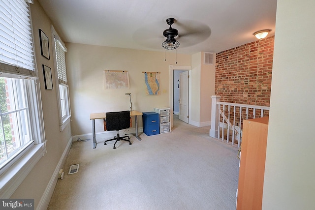 home office featuring ceiling fan and light colored carpet