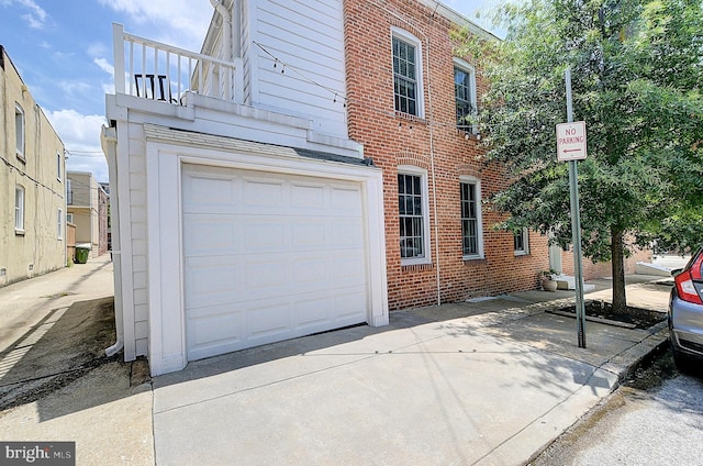 view of side of property featuring a garage