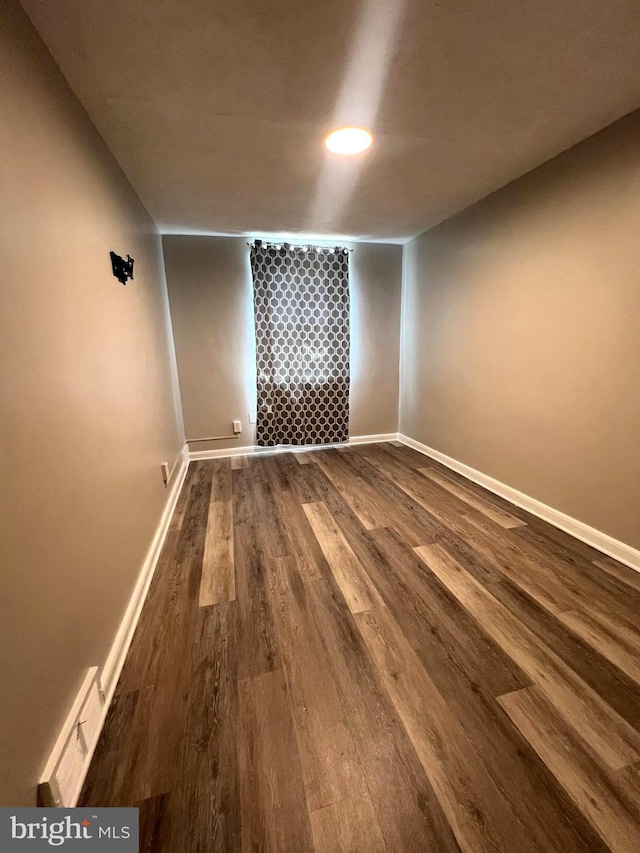 empty room featuring hardwood / wood-style floors