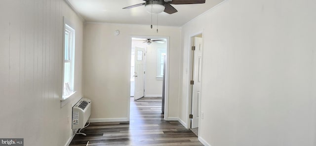 hallway with ornamental molding, dark hardwood / wood-style flooring, and a wall mounted air conditioner