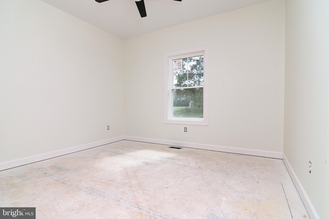 spare room with ceiling fan