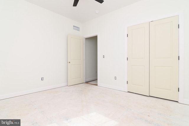 unfurnished bedroom with a closet and ceiling fan