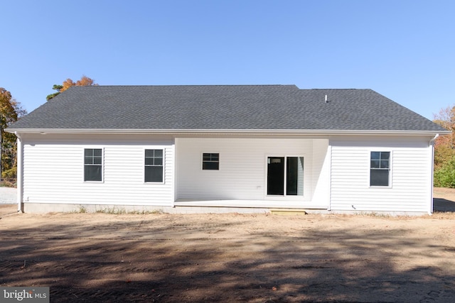 back of house with a patio area