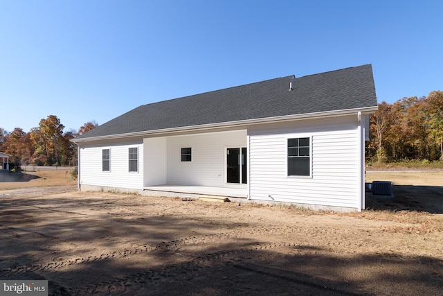 back of property featuring a patio and central AC unit