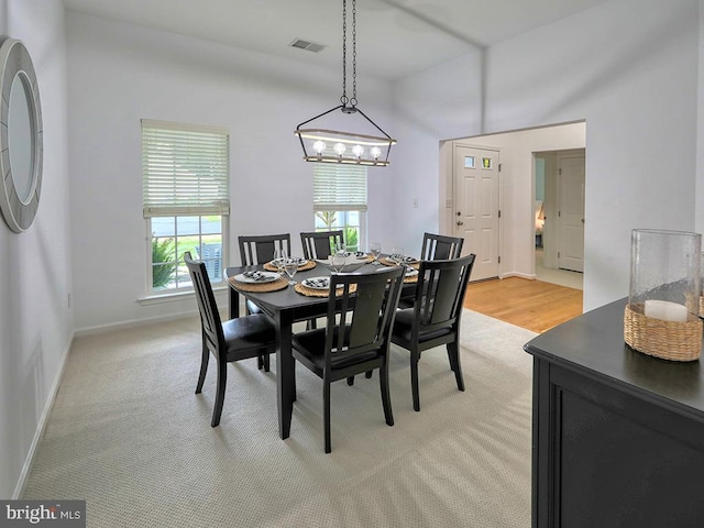 view of carpeted dining space