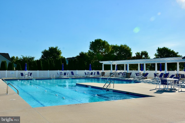 view of pool featuring a patio