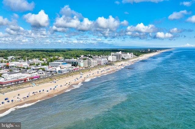 aerial view featuring a view of the beach and a water view