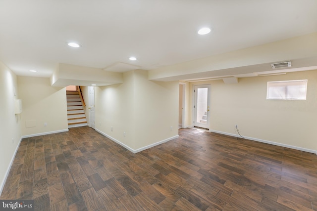 basement with stairway, visible vents, wood finished floors, and recessed lighting