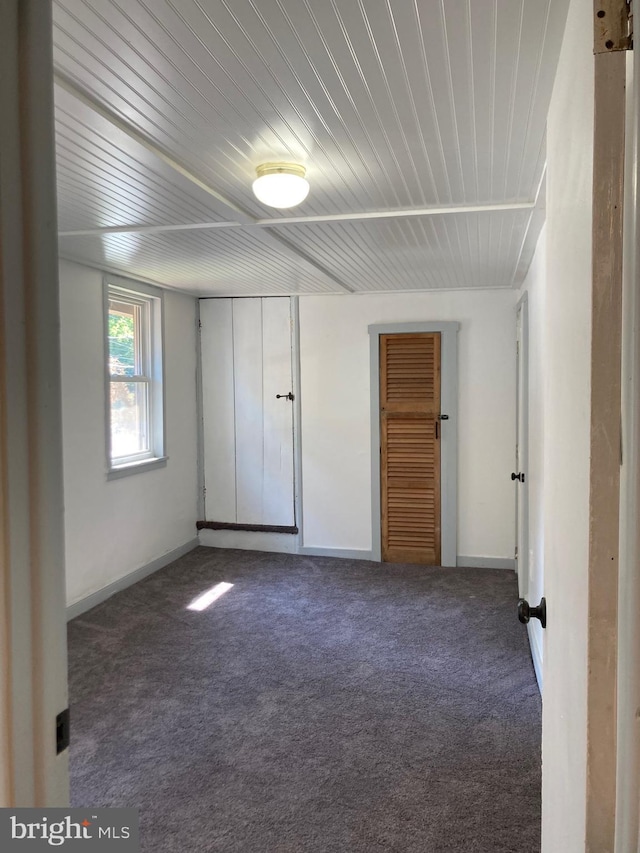 unfurnished bedroom featuring carpet floors