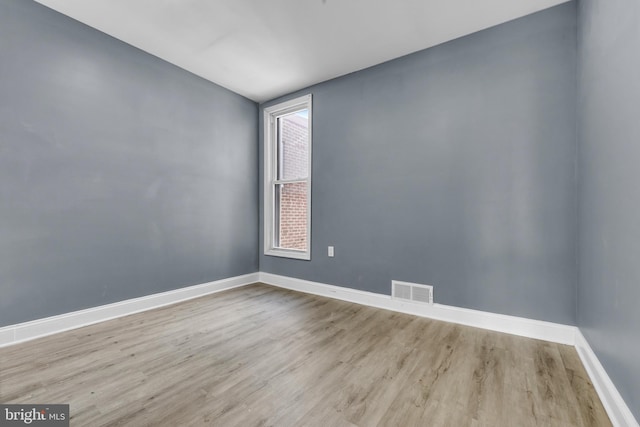 empty room featuring light hardwood / wood-style floors