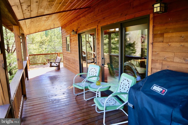 wooden terrace with grilling area