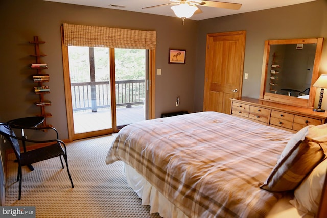 bedroom with carpet flooring, ceiling fan, and access to outside