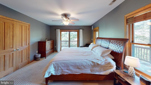 bedroom featuring ceiling fan, access to exterior, and light carpet