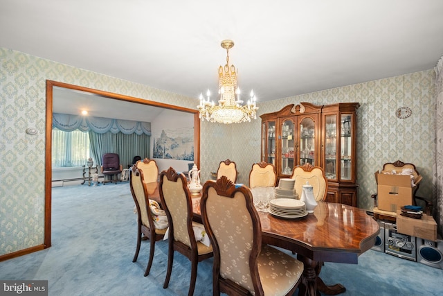 dining space with light carpet, a baseboard radiator, and an inviting chandelier