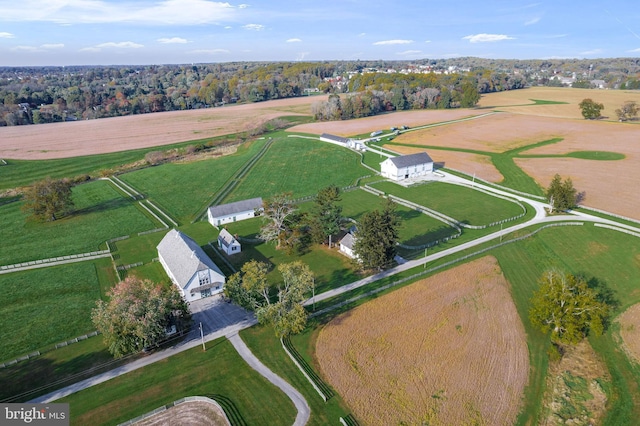 birds eye view of property featuring a rural view