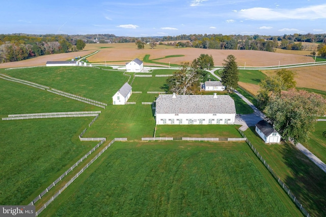 birds eye view of property featuring a rural view