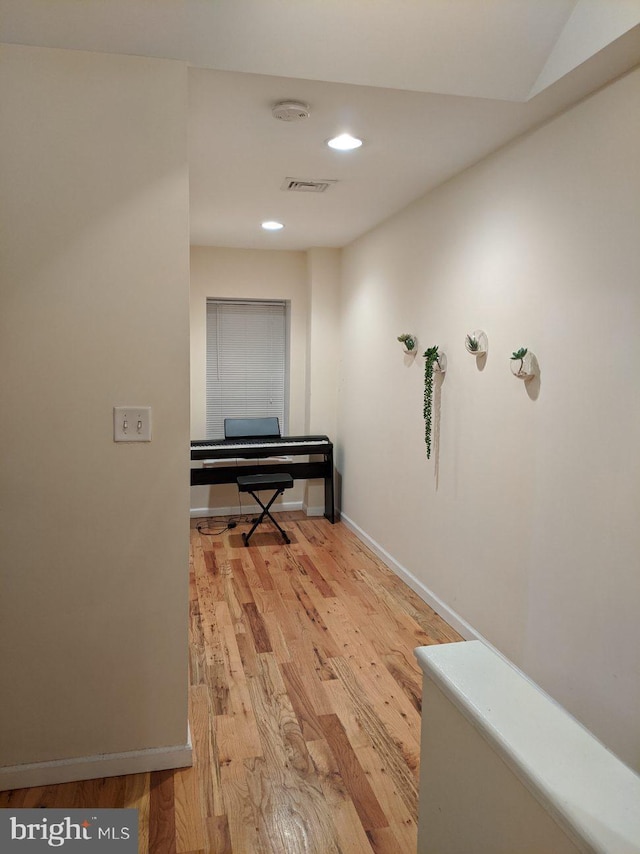 hall featuring light hardwood / wood-style floors