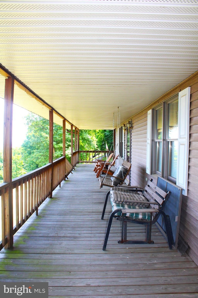 wooden deck with a porch